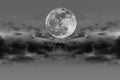 Nighttime sky with clouds and bright full moon with shiny. Royalty Free Stock Photo