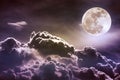 Nighttime sky with clouds and bright full moon with shiny. Vint Royalty Free Stock Photo