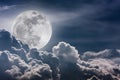 Nighttime sky with clouds and bright full moon with shiny. Vint Royalty Free Stock Photo