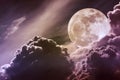 Nighttime sky with clouds and bright full moon with shiny. Vint Royalty Free Stock Photo