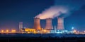Nighttime View Of Industrial Landscape Nuclear Power Plant With Chimneys And Cooling Towers