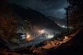 nighttime view of landslide with searchlights shining on the scene