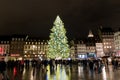 Nighttime view of the Place Kleber Square in Strasbourg with many people admiring the large and iconic Christmas tree Royalty Free Stock Photo