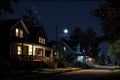 nighttime view of a row of houses with outdoor lights on