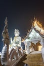 Nighttime at Wat Huay Pla Kang temple,lit up,with Big Buddha towering beyond,Chiang Rai City,Thailand Royalty Free Stock Photo