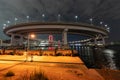 Nightview of Rainbow Bridge, illuminated in red as a sign of coronavirus alert Royalty Free Stock Photo