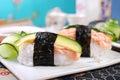 Nigiri sushi with salmon and avocado
