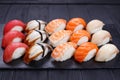 Nigiri sushi with salmon, grouper, eel, tuna and prawn, served o Royalty Free Stock Photo