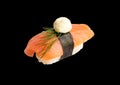 Nigiri Sushi with Salmon and Seaweed Nori on Black Background Royalty Free Stock Photo