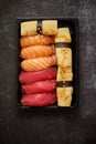 Nigiri sushi set in plastic container ready for takeout delivery. Closeup of take away lunch box Royalty Free Stock Photo