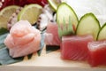 Nigiri sushi with shrimp and tuna fish on a gourmet platting on black background.