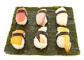 Nigirizushi sushi over nori sheet Royalty Free Stock Photo