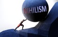 Nihilism as a problem that makes life harder - symbolized by a person pushing weight with word Nihilism to show that Nihilism can Royalty Free Stock Photo