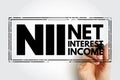 NII Net Interest Income - difference between revenues generated by interest-bearing assets and the cost of servicing liabilities, Royalty Free Stock Photo