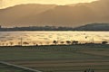Raft frames for culturing oyster at Lake Kamo in Sado, Niigata, Japan, at sunrise