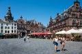Nijmegen, Gelderland, The Netherlands - Young people walking of the historical market square of old town