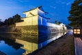 Nijo Castle moat Southeast Corner Yagura Turret lighting at night. Kyoto, Japan