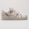 Nike Air Force 1 07 LX beige and black paint splash sneaker