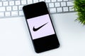 Nike app logo on a smartphone screen. Royalty Free Stock Photo