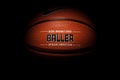 Nike brand, basketball ball Nike Baller. Orange rubber outdoor ball, ultra-durable cover, close-up on a black background