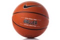 Nike brand, basketball ball Nike Baller. Orange rubber outdoor ball, ultra-durable cover, close-up on a white background