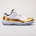 Nike Jordan 11 Retro Low white and gold sneaker
