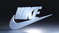 Nike logo and font in isometric view on dark background. 3D render.