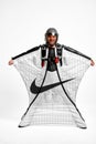 Nike. Men in wing suit equipment.Demonstration of popular brands. Simulator of free fall.