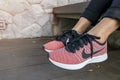 The NIKE pink shoes with red box of women for exercise at the park