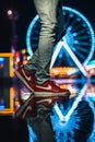 Nike Vapormax Tropical Sunset, Water Reflection. Nike Air Max colourful night shot in a puddle reflection amusement park