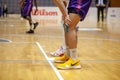 Nike yellow basketball shoes on parquet floor during basketball match of Ukrainian Superleague