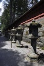 Nikko, 11th may: Alley with stone lanterns to Futurasan Jinja Shrine Temple in Nikko National Park of Japan Royalty Free Stock Photo