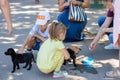 Nikolaev, Ukraine- August 15, 2020: volunteer exhibition of stray dogs. Dog training, preparation for exhibition, pets. Children