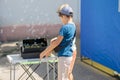 Nikolaev, Ukraine- August 15, 2020: volunteer exhibition of stray dogs. ÃÂ¡hildren play with a machine that makes soap bubbles.