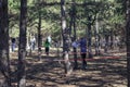 Nikolaev, Ukraine - October 14, 2020: sports orienteering competition among schoolchildren in pine forest