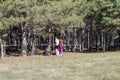 Nikolaev, Ukraine - October 14, 2020: sports orienteering competition among schoolchildren in pine forest