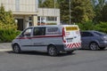 Nikolaev, Ukraine - September 19, 2020: Pilot Vehicle Escorting Oversize Transports in the parking lot at the hotel