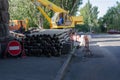 Nikolaev, Ukraine - September 20, 2020: A truck crane unloads soil drills from a truck