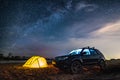 Nikolaevka, Russia - May 04, 2019: Tourist tent and car under night sky