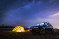 Nikolaevka, Russia - May 04, 2019: Tourist tent and Subaru Forester under night starry sky