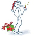 Stick figure makes as a santa a cigarette break Royalty Free Stock Photo