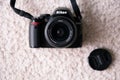 Nikon DSLR D3000 camera with 18-55 lens, front view