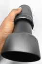 Nikon 70-300mm camera lens holding with hand in white background.Abu Dhabi,UAE.31/05/2020 Royalty Free Stock Photo