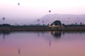 Nile river at sunrise with hot air balloons in Luxor, Egypt. Royalty Free Stock Photo