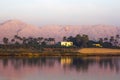 Nile river at sunrise with hot air balloons in Luxor, Egypt. Royalty Free Stock Photo