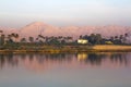 Nile river at sunrise with hot air balloons in Luxor, Egypt. Royalty Free Stock Photo