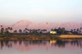 Nile river at sunrise with hot air balloons in Luxor, Egypt. Royalty Free Stock Photo