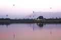 Nile river at sunrise with hot air balloons in Luxor, Egypt. Royalty Free Stock Photo