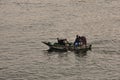 Nile river basin carrying life Egyptians trying to sell fish to ships