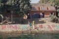 Women Drying Rugs on the Banks of the Nile River, Egypt